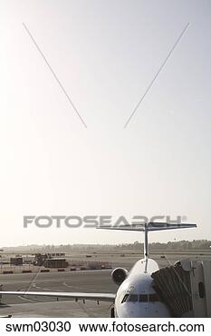 Stock Photography - airplane and jetway. 
fotosearch - search 
stock photos, 
pictures, images, 
and photo clipart