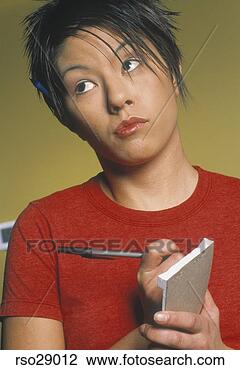 Stock Photo - asian waitress 
writing food order. 
fotosearch - search 
stock photos, 
pictures, images, 
and photo clipart