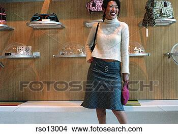 Stock Photo - asian woman in 
store. fotosearch 
- search stock 
photos, pictures, 
images, and photo 
clipart