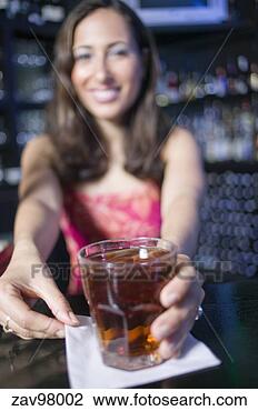 Stock Photo - bartender offering 
drink. fotosearch 
- search stock 
photos, pictures, 
images, and photo 
clipart