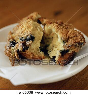 Stock Photo - blueberry muffin 
with napkin on 
plate. fotosearch 
- search stock 
photos, pictures, 
images, and photo 
clipart