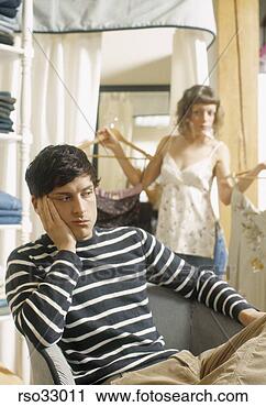 Stock Photography - bored man waiting 
for girlfriend. 
fotosearch - search 
stock photos, 
pictures, images, 
and photo clipart