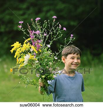Stock Photo - boy in field with 
bouquet of wildflowers. 
fotosearch - search 
stock photos, 
pictures, images, 
and photo clipart