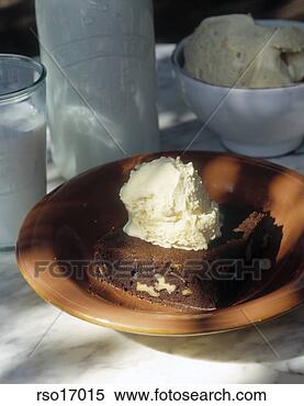 Stock Image - brownie with scoop 
of ice cream. 
fotosearch - search 
stock photos, 
pictures, images, 
and photo clipart