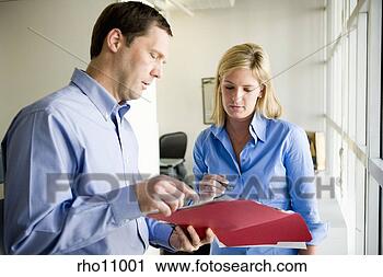 Stock Photography - business people 
discussing business 
file. fotosearch 
- search stock 
photos, pictures, 
images, and photo 
clipart
