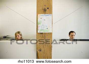 Stock Photo - business people 
working in cubicle 
between picture. 
fotosearch - search 
stock photos, 
pictures, images, 
and photo clipart