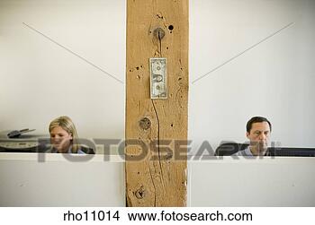Stock Photo - business people 
working in cubicle 
between dollar. 
fotosearch - search 
stock photos, 
pictures, images, 
and photo clipart