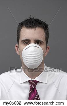 Stock Photo - business person 
wearing pollution 
mask. fotosearch 
- search stock 
photos, pictures, 
images, and photo 
clipart
