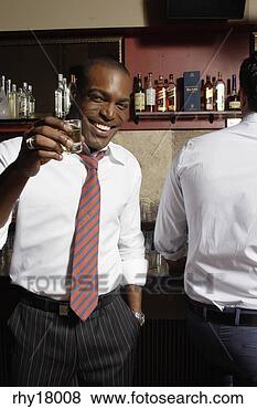 Stock Photo - businessman having 
shots in bar. 
fotosearch - search 
stock photos, 
pictures, images, 
and photo clipart