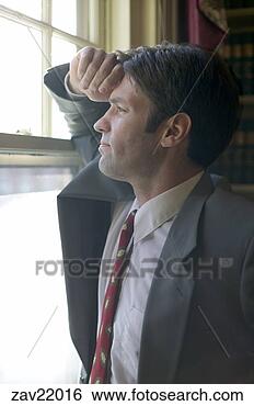 Stock Photo - businessman looking 
out window. fotosearch 
- search stock 
photos, pictures, 
images, and photo 
clipart