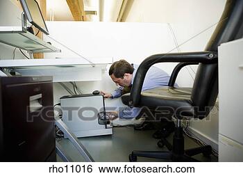 Stock Photo - businessman powering 
computer. fotosearch 
- search stock 
photos, pictures, 
images, and photo 
clipart
