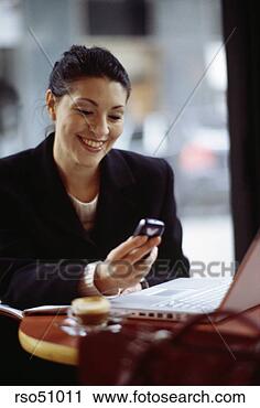 Stock Photography - businesswoman 
text messaging. 
fotosearch - search 
stock photos, 
pictures, images, 
and photo clipart