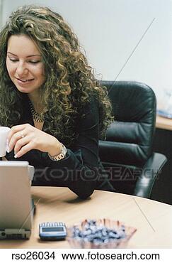 Stock Photo - businesswoman 
using laptop. 
fotosearch - search 
stock photos, 
pictures, images, 
and photo clipart