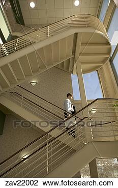 Stock Photo - businesswoman 
walking down staircase. 
fotosearch - search 
stock photos, 
pictures, images, 
and photo clipart