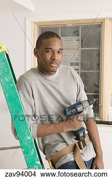 Stock Photo - carpenter resting 
on step ladder. 
fotosearch - search 
stock photos, 
pictures, images, 
and photo clipart