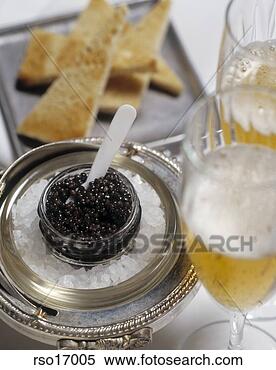 Stock Image - caviar and champagne 
on ice. fotosearch 
- search stock 
photos, pictures, 
images, and photo 
clipart