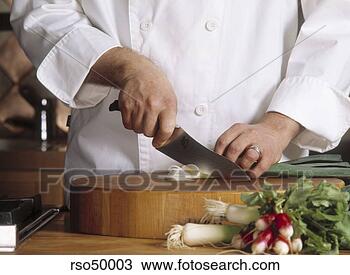 Stock Photo - chef chopping 
leeks with french 
knife on wooden 
cutting board. 
fotosearch - search 
stock photos, 
pictures, images, 
and photo clipart