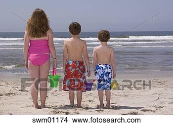 Stock Photo - children holding 
buckets on beach. 
fotosearch - search 
stock photos, 
pictures, images, 
and photo clipart