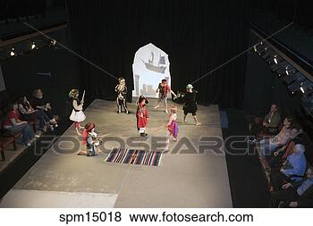 Stock Photo - children performing 
on stage. fotosearch 
- search stock 
photos, pictures, 
images, and photo 
clipart