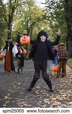 Stock Image - children trick 
or treating on 
halloween. fotosearch 
- search stock 
photos, pictures, 
images, and photo 
clipart
