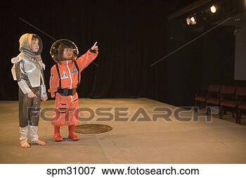 Picture - children wearing 
astronaut costumes. 
fotosearch - search 
stock photos, 
pictures, images, 
and photo clipart