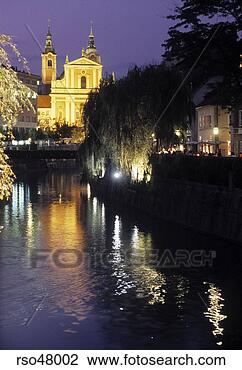 Stock Photo - church lit up 
at night, old 
town ljubljana, 
slovenia. fotosearch 
- search stock 
photos, pictures, 
images, and photo 
clipart