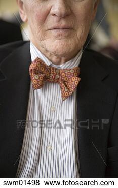 Stock Photo - close-up of senior 
man wearing bow 
tie. fotosearch 
- search stock 
photos, pictures, 
images, and photo 
clipart