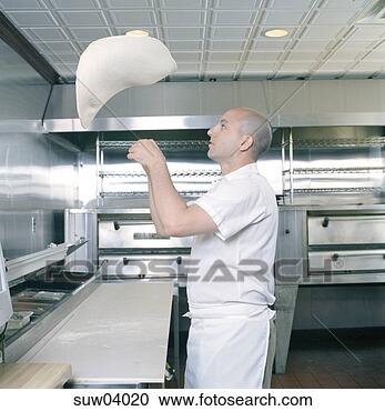 Stock Photography - cook tossing pizza 
dough. fotosearch 
- search stock 
photos, pictures, 
images, and photo 
clipart