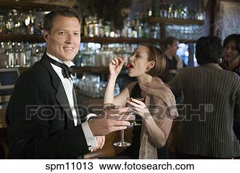 Stock Photo - couple at bar. 
fotosearch - search 
stock photos, 
pictures, images, 
and photo clipart