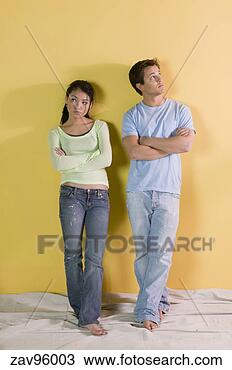 Stock Photo - couple examining 
unfinished room. 
fotosearch - search 
stock photos, 
pictures, images, 
and photo clipart