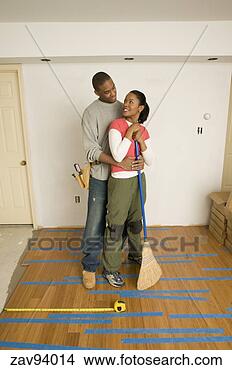 Stock Photo - couple standing 
on unfinished 
wood floor. fotosearch 
- search stock 
photos, pictures, 
images, and photo 
clipart