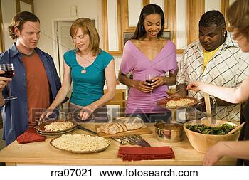 Stock Photography - couples cooking 
in kitchen. fotosearch 
- search stock 
photos, pictures, 
images, and photo 
clipart