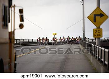 Stock Photography - cyclists on city 
street. fotosearch 
- search stock 
photos, pictures, 
images, and photo 
clipart