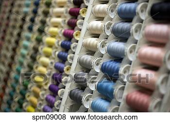 Stock Photo - different colored 
spools of thread 
on display. fotosearch 
- search stock 
photos, pictures, 
images, and photo 
clipart