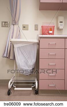 Stock Photograph - disposal container 
and dirty laundry 
in examination 
room. fotosearch 
- search stock 
photos, pictures, 
images, and photo 
clipart