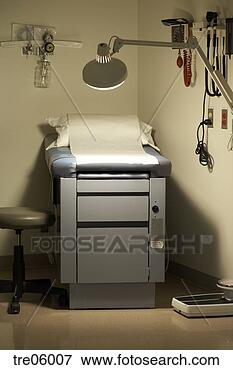 Picture - examination table 
in doctor's office. 
fotosearch - search 
stock photos, 
pictures, images, 
and photo clipart