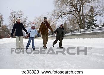 Stock Photo - family ice skating 
hand-in-hand. 
fotosearch - search 
stock photos, 
pictures, images, 
and photo clipart