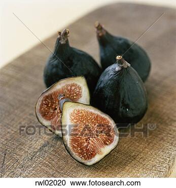 Stock Photography - figs cut in half. 
fotosearch - search 
stock photos, 
pictures, images, 
and photo clipart