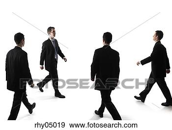 Stock Photograph - four business 
people walking. 
fotosearch - search 
stock photos, 
pictures, images, 
and photo clipart