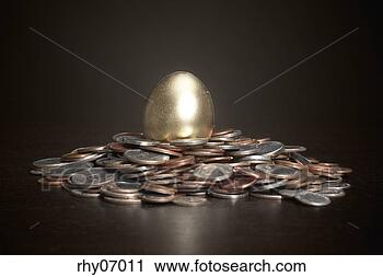 Stock Photography - golden egg with 
pile of coins. 
fotosearch - search 
stock photos, 
pictures, images, 
and photo clipart
