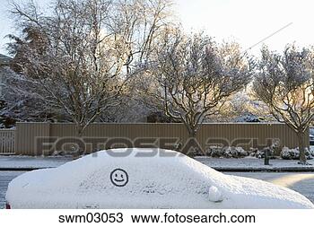 Stock Photo - happy face drawn 
on snow-covered 
car. fotosearch 
- search stock 
photos, pictures, 
images, and photo 
clipart