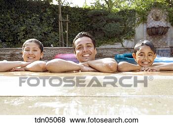 Stock Photo - hispanic family 
leaning out of 
pool. fotosearch 
- search stock 
photos, pictures, 
images, and photo 
clipart