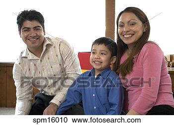 Stock Photography - hispanic family 
sitting. fotosearch 
- search stock 
photos, pictures, 
images, and photo 
clipart