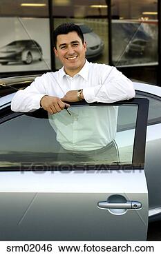 Stock Photo - hispanic man with 
new car. fotosearch 
- search stock 
photos, pictures, 
images, and photo 
clipart