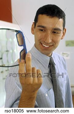 Stock Image - hispanic man shopping 
for sunglasses. 
fotosearch - search 
stock photos, 
pictures, images, 
and photo clipart