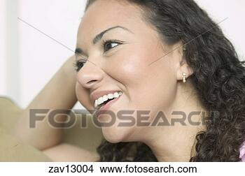 Stock Photo - hispanic woman's 
smiling face. 
fotosearch - search 
stock photos, 
pictures, images, 
and photo clipart
