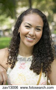 Stock Photo - hispanic woman 
smiling. fotosearch 
- search stock 
photos, pictures, 
images, and photo 
clipart