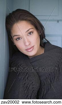 Stock Photo - hispanic woman 
wrapped up in 
blanket. fotosearch 
- search stock 
photos, pictures, 
images, and photo 
clipart