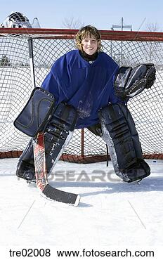 Stock Photo - ice hockey goalie 
in goal. fotosearch 
- search stock 
photos, pictures, 
images, and photo 
clipart