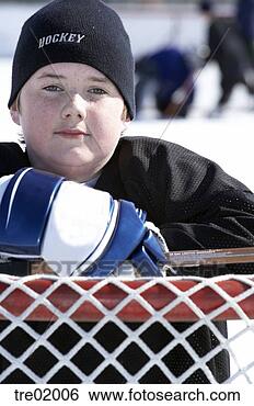 Stock Photo - ice hockey player 
leaning on goal. 
fotosearch - search 
stock photos, 
pictures, images, 
and photo clipart